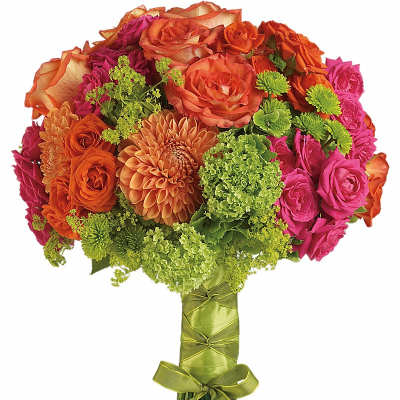 Bouquet of orange and pink roses with green accents and ribbon wrap