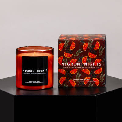 Amber candle and matching box with orange slice pattern