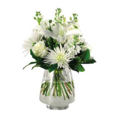 White floral arrangement in a clear glass vase