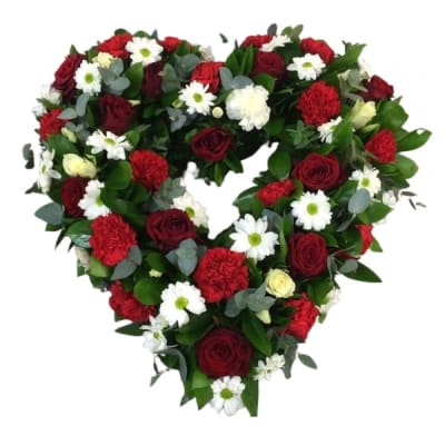 Heart-shaped floral wreath with red roses, white daisies, and carnations