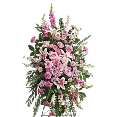 Tall pink and white floral standing spray with lilies and roses