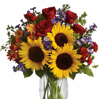 Bouquet of sunflowers, red roses, and purple flowers in a clear glass vase