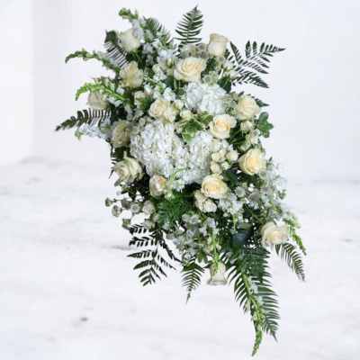 White floral spray with roses and hydrangeas