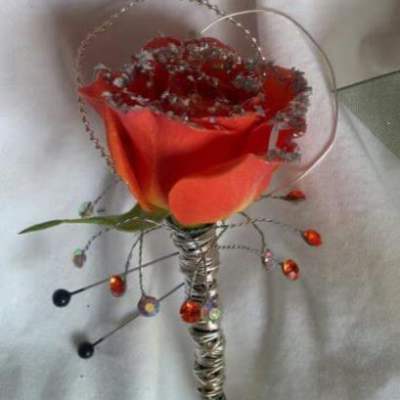 Red calla lily bouquet with decorative wire accents