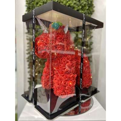 Red rose unicorn figure with lights in a clear display box with black base and lid