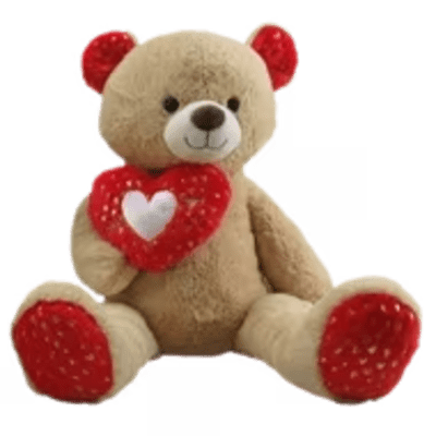 Teddy bear holding a red heart