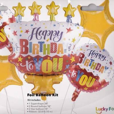 Birthday foil balloons in gold and multicolor with star shapes