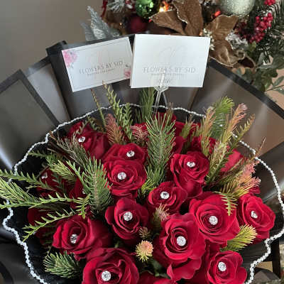 25 Red Roses hand tied bouquet