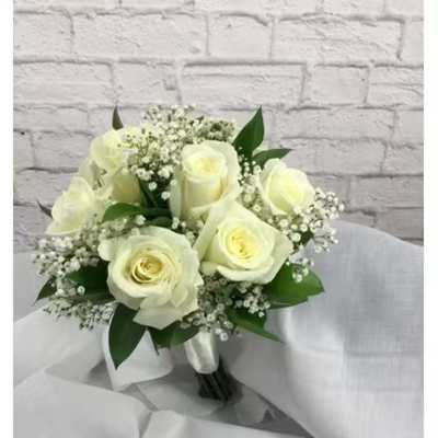 White rose bouquet with baby's breath and greenery