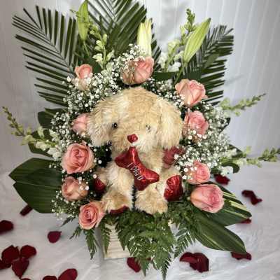 flores con con peluche
