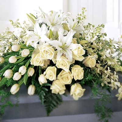 All white elegant casket spray