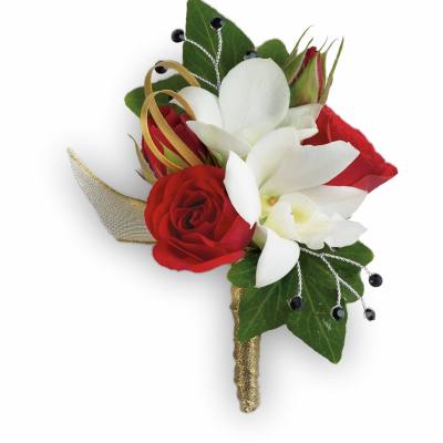 Red and white floral boutonniere with gold ribbon and green leaves