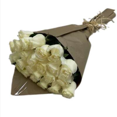 Bouquet of cream roses wrapped in brown paper