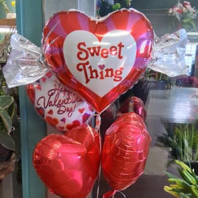 Heart-shaped Valentine balloons with red and silver foil balloons