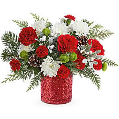 Red and white floral arrangement in a glittery red vase