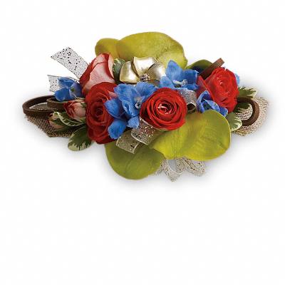 Red roses and blue flowers arranged with ribbon and green petals