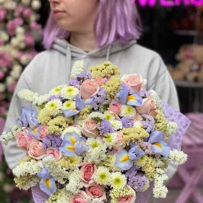 Large pastel bouquet of pink roses and lavender flowers