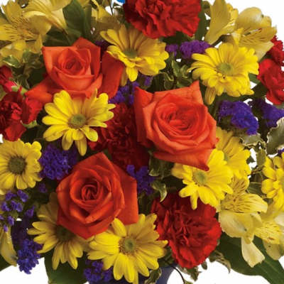 Bouquet of red roses, yellow daisies, and purple filler flowers