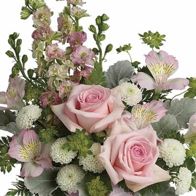 Bouquet of pink roses, white blooms, and pale alstroemeria