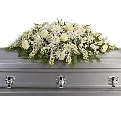 White floral casket spray with chrysanthemums and lilies