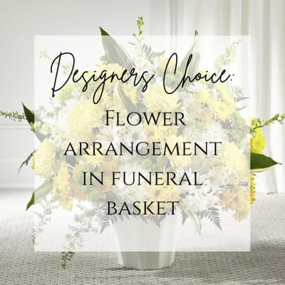 Yellow and white flower arrangement in a white vase