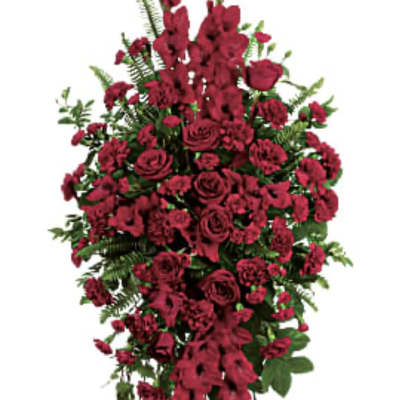 Tall red floral standing spray on an easel