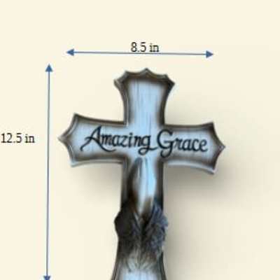 Cross-shaped memorial plaque with the words Amazing Grace