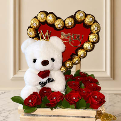 Beautiful design of a box with a bear, heart, Ferrero Rocher chocolates, and roses.
