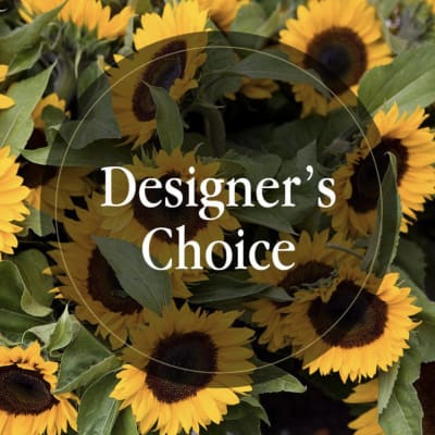 Cluster of bright yellow sunflowers with dark centers and “Designer’s Choice” text overlay