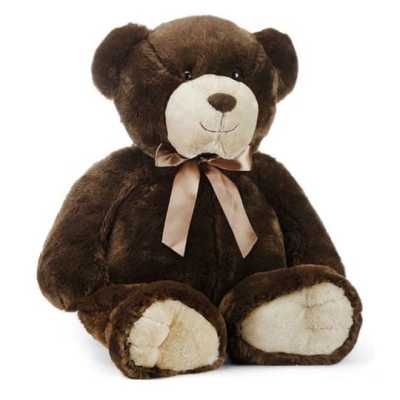 Large brown teddy bear with cream face and paws and a satin ribbon bow at its neck