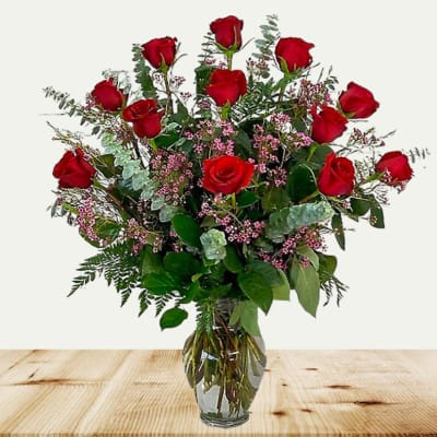 Bouquet of red roses in a clear glass vase