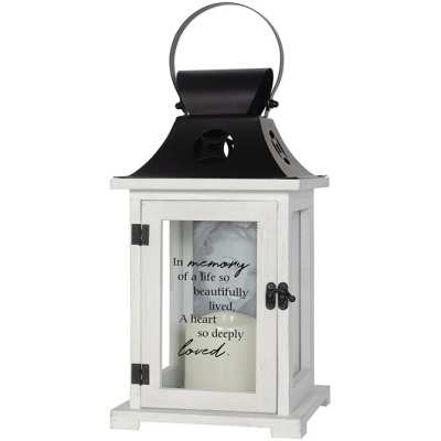 White memorial lantern with black metal top and remembrance verse on the glass door.