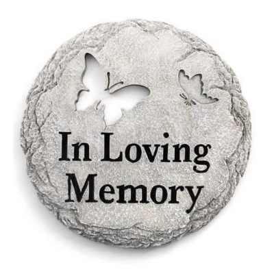 Round gray memorial stone with butterfly cutouts and the words In Loving Memory