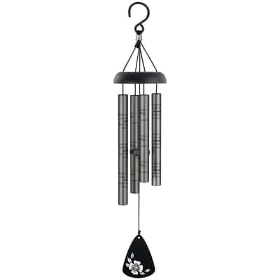 Metal wind chime with silver tubes and black sail featuring a white flower graphic