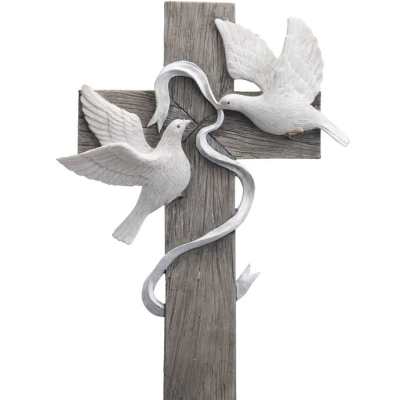 Rustic wooden cross wall decor with two white doves and a flowing silver ribbon