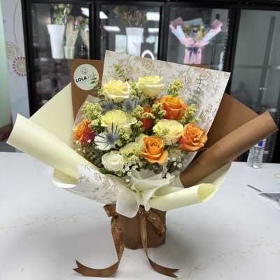 Bouquet Yellow and Orange Hand wrapped