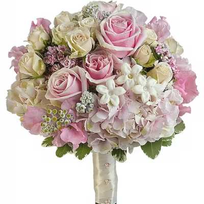 Pink and white rose bouquet with hydrangeas and small white flowers