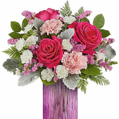Pink roses and carnations in a purple glass vase