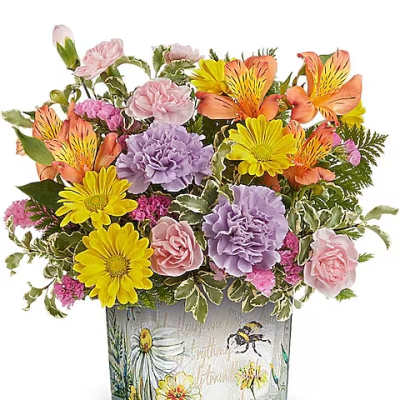 Colorful bouquet in a square glass vase with floral artwork