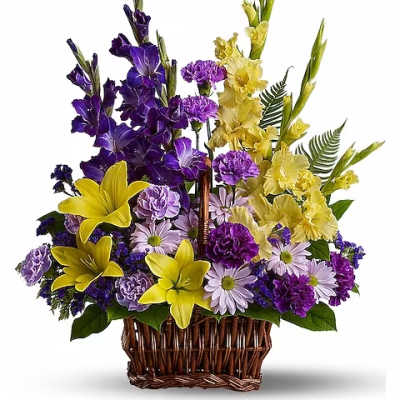 Basket arrangement of purple and yellow flowers