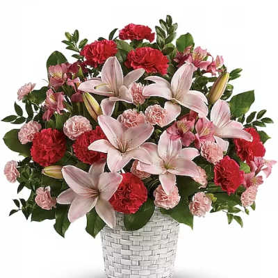 Pink lilies and red carnations in a white woven vase