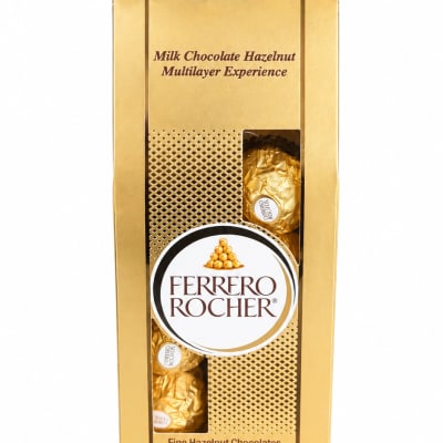 Red rose on top of a Ferrero Rocher chocolate box