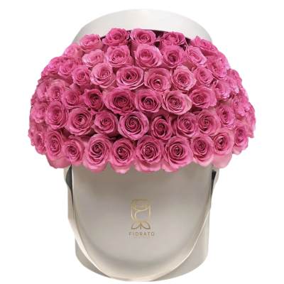 Large bouquet of pink roses in a beige hatbox