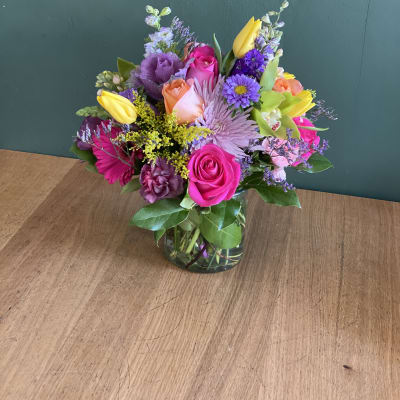 Colorful mixed bouquet in a glass vase