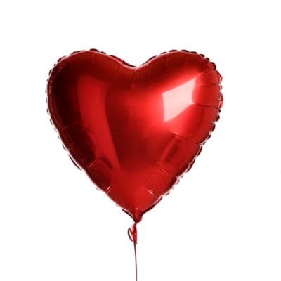 Red heart-shaped balloon on a string