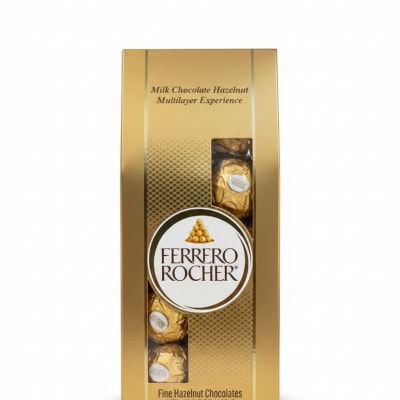 Gold rectangular box of Ferrero Rocher hazelnut chocolates standing upright on a white background