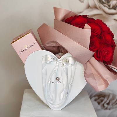 Red rose bouquet with a pink champagne box and white heart gift box