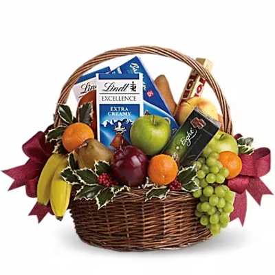 Fruit basket with chocolates and a ribbon bow