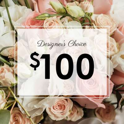 Bouquet of blush and white roses with a $100 price overlay