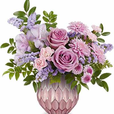 Pink and lavender bouquet in a textured pink vase